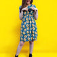Mum showing breastfeeding access via zips on her sunflower breastfeeding dress from MilkyMoon. 